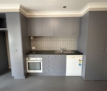 Modern Inner-City Living with Pool & Gym Access - Photo 4