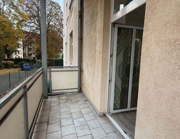 Schöne helle Erdgeschoss 2 Raum Wohnung mit Balkon und Einbauküche ab sofort zu vermieten - Foto 1