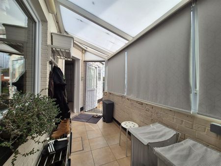 Knusse woning met tuin en garage. - Photo 3