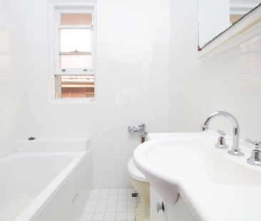 Charming Two Bedroom Apartment Bursting With Character - Photo 5