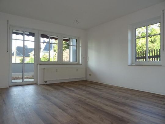 Zweiraum-EG-Wohnung mit Terrasse in TOP-Wohnlage! - Photo 1