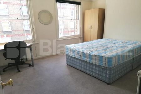 Georgian house,two bathrooms, charming patio garden & highly desirable address - Photo 5