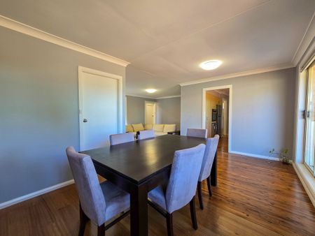 Spacious Family Home with Drive-Through Parking & Outdoor Entertaining - Photo 4