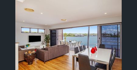 Exquisite 4-Bedroom Luxury Waterfront Living with Breathtaking Views - Photo 4