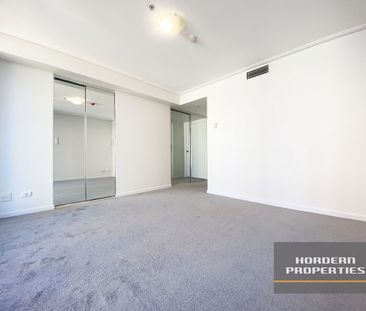 Spectacular Two-Bedroom Apartment with Stunning City Views in the H... - Photo 3