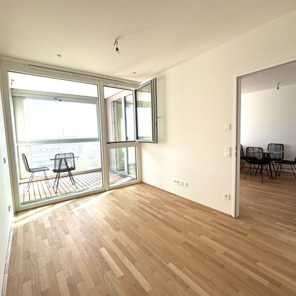 U-Bahn-Station U1 Kagran I Moderne Wohnung mit hochwertiger Ausstattung und Loggia I Donau Zentrum Nähe I Rooftop Pool I Sauna & Fitness - Photo 1