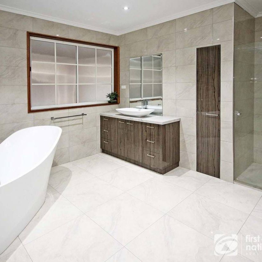 Sitting Amongst the Flowers - Photo 1