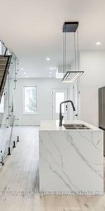 Stunning newly renovated home in Prime Danforth W/ Parking - Photo 3