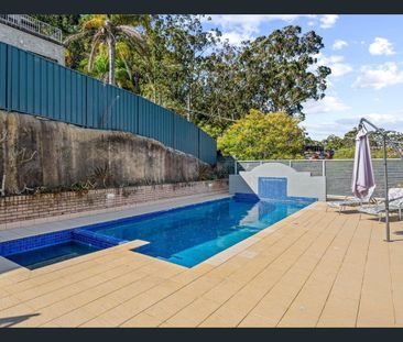 Sun-Drenched, Spacious & Convenient Living - Photo 1