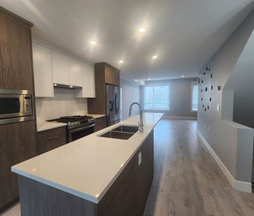 Stunning Three Bedroom Townhouse with Huge Roof Top Patio, Yard and... - Photo 1