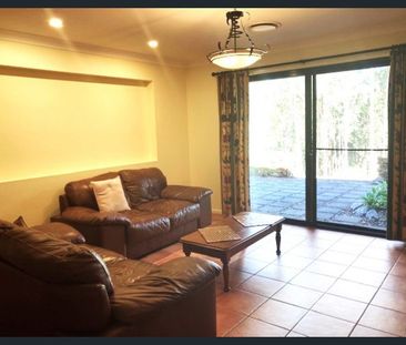 Spacious property with multiple living spaces - Photo 1