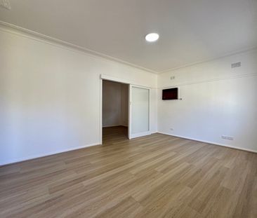 MODERN FAMILY HOME WITH MULTIPLE LIVING SPACES! - Photo 3