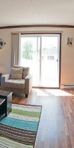 Beau grand 5 1/2 Sur Boul. Thibeau - Photo 4