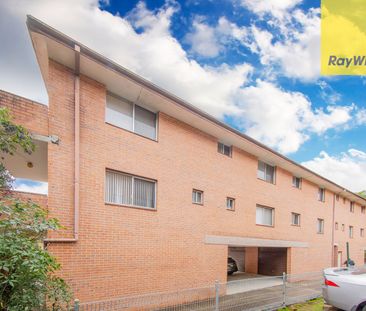 TOP FLOOR UNIT IN SUPERB LOCATION! - Photo 2