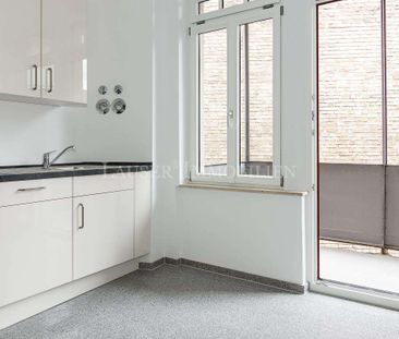Attraktive Drei-Zimmer-Altbauwohnung mit Balkon in kernsaniertem Haus - Foto 1