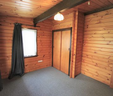 Sunny Two-Bedroom Home with Garage – Available 1 December - Photo 1