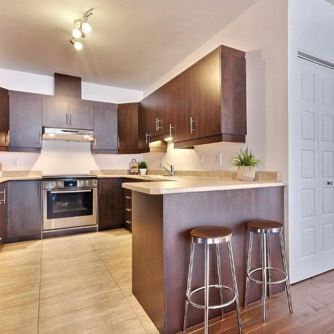 Grands condos 2 ch. Entrée ind. Idéal famille Lebourgneuf Quebec à louer - appartement / logement - Photo 1