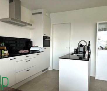 Modern appartement met 2 slaapkamers, terras, kelderberging en autostaanplaats nabij het centrum van Dessel. - Foto 6