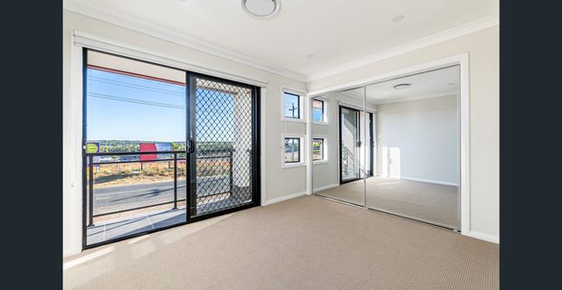 Modern living in the heart of booming Box Hill! - Photo 1