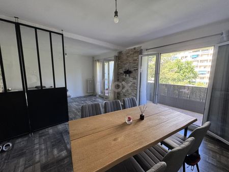 Appartement 4 pièce(s) 66.99 m² - Photo 2