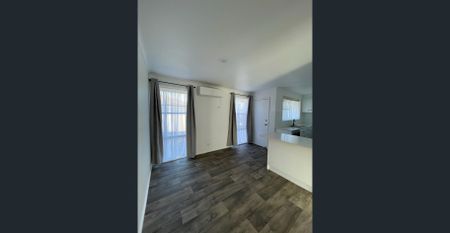 Modern Comfort and Easy Living with Gardener Included - Photo 2