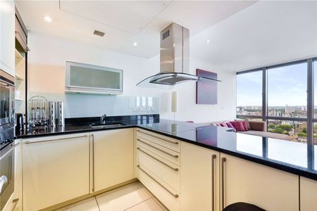 An interior designed 2 bedroom apartment situated on the 26th floor of this striking development located close to heart of Canary Wharf's Business district. - Photo 5