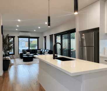 Spacious, Stylish & Perfectly Positioned - Photo 1