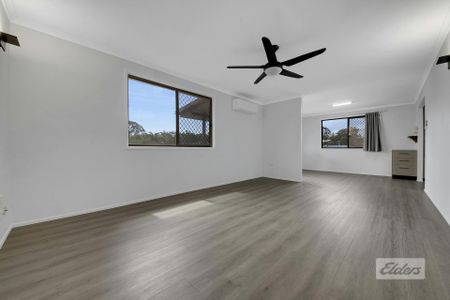 THIS PROPERTY OFFERS LOW MAINTENANCE LIVING WITH A SPACIOUS YARD , PRACTICAL LAYOUT AND SOLAR! - Photo 3