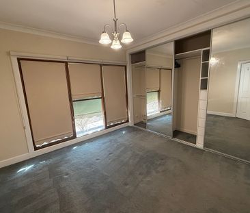 CENTRALLY LOCATED LOW MAINTENANCE HOME - Photo 3