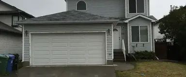 3 Bedroom 2.5 Bathroom Double Garage Backing onto Green Space House | 126 Saratoga Close Northeast, Calgary - Photo 1