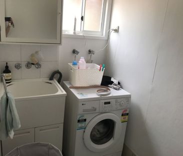 QUIET ESCAPE IN WEST END! A MUST INSPECT! - Photo 2