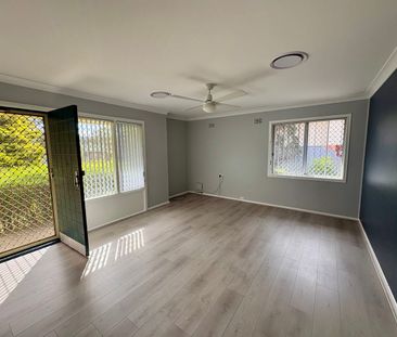 Neat & Affordable Four-Bedroom Home - Photo 1