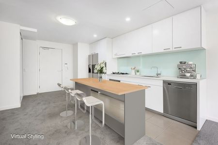 Impressive Designer Apartment with Serene Outlook! - Photo 3