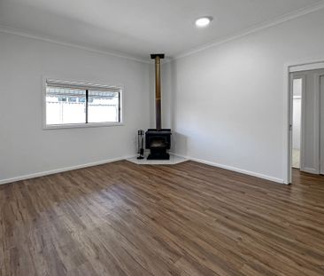 Renovated Three-Bedroom Home Close to the CBD - Photo 4