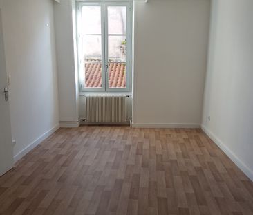 TRIPLEX CENTRE CHARLIEU 66.19 M2 - Photo 5