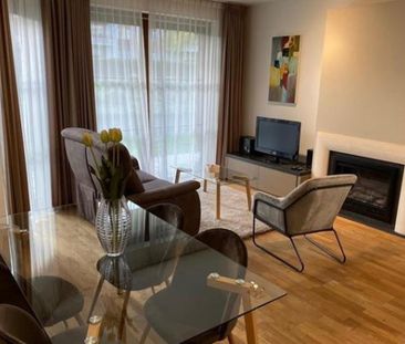 Proche de la Maison Communale, beau rez-de-chaussée meublé de 2 cha... - Photo 4