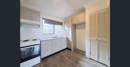 PEACEFUL TWO-BEDROOM TOWNHOUSE WITH LUG IN PRIME LOCATION - Photo 5