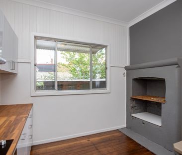 freshly renovated three-bedroom home - Photo 1
