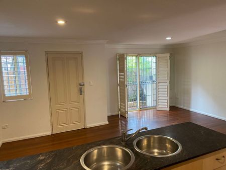 Spacious Two-Bedroom Townhouse With Parking - Photo 3