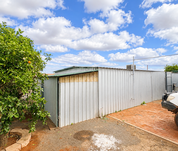 Freshly Renovated 3-Bedroom Home with Huge Workshop & Parking - Photo 6