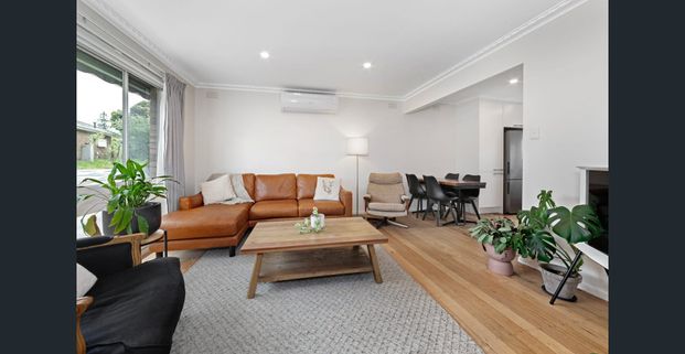 NATURAL LIGHT FLOODS THROUGHOUT THIS BEAUTIFULLY RENOVATED OPEN PLAN TWO BEDROOM UNIT - Photo 1