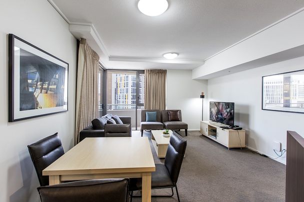 Fully Furnished with Utilities Included - Aurora Towers - Photo 1