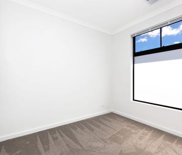 Contemporary Comfort - Modern Townhouse Living - Photo 3