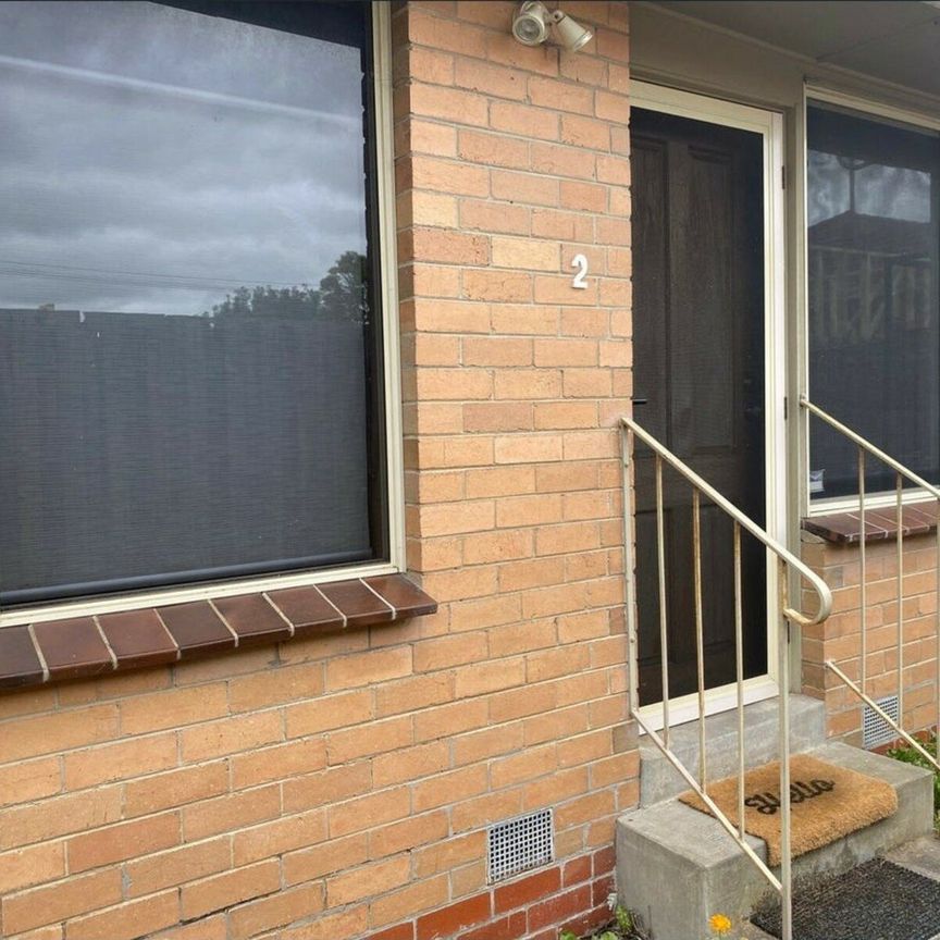 Neat & Low-Maintenance Living in a Prime Location - Photo 1
