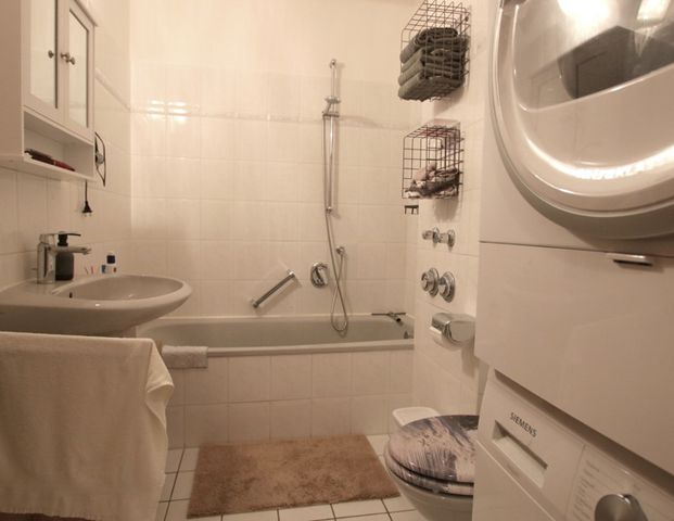 Obergeschosswohnung mit Loggia und Pkw-Stellplatz in Westerstede – zentrale Wohnlage - Photo 1