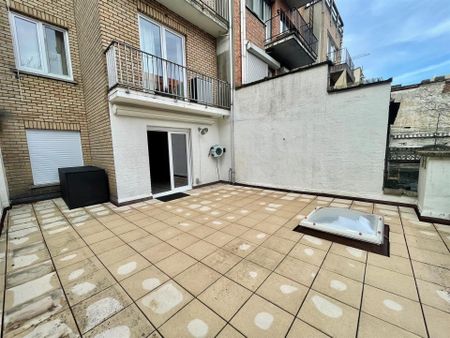 Ruim 2-slaapkamer appartement met terras (40m²) en autostaanplaats! - Foto 5