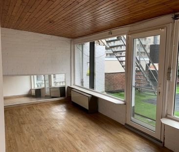 Ruim 1-slaapkamerappartement met terras te huur in centrum Genk! - Photo 2