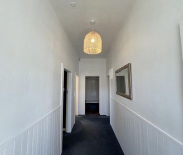 Centrally located three-bedroom home - Photo 6