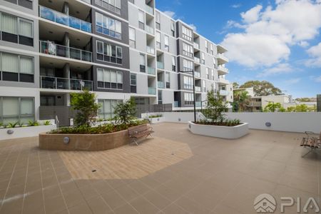 Entry via block B,2-bedroom modern apartment now for lease - Photo 3