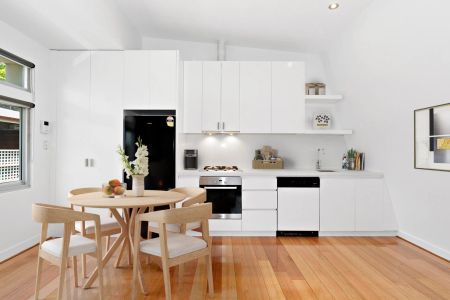 Modern Two-Bedroom Townhouse with Balcony and Secure Garage - Photo 4